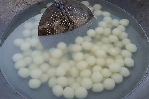Rasagola cooking in syrup